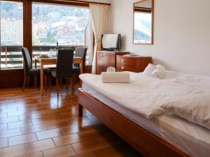Ein Bett oder Betten in einem Zimmer der Unterkunft Apartment Terrasses Du Soleil 9a