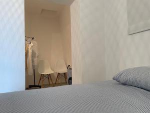 Postel nebo postele na pokoji v ubytování Apartmani Pulić
