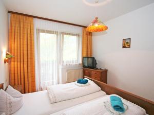 Lova arba lovos apgyvendinimo įstaigoje Apartment Gasteighof-5 by Interhome