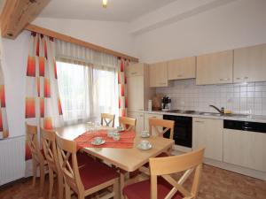 A kitchen or kitchenette at Apartment Gasteighof-1 by Interhome