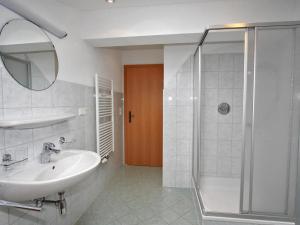 A bathroom at Apartment Gasteighof-1 by Interhome