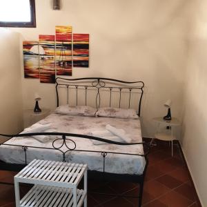 Posteľ alebo postele v izbe v ubytovaní I Cordari di Ortigia La Garitta