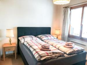 Postel nebo postele na pokoji v ubytování Apartment Chalet Blaugletscher by Interhome