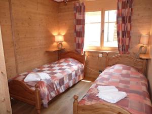 Katil atau katil-katil dalam bilik di Apartment Ardève No 7 by Interhome