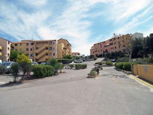 an empty parking lot in a city with buildings at Apartment Pleine Vue sur Mer by Interhome in Saint Pierre La Mer