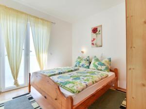Postel nebo postele na pokoji v ubytování Apartment Jadran-4 by Interhome