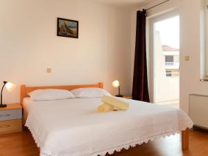Postel nebo postele na pokoji v ubytování Apartment Marija-2 by Interhome