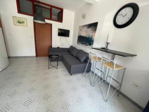 TV a/nebo společenská místnost v ubytování Apartmani Pulić