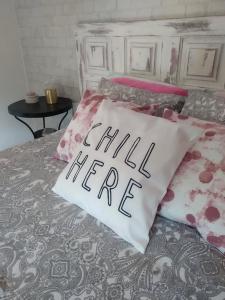 Cama ou camas em um quarto em DEl Rey Guest House