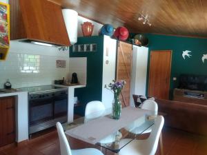 A cozinha ou cozinha compacta de DEl Rey Guest House