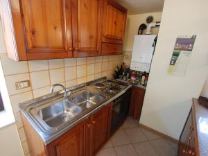 Kuchyň nebo kuchyňský kout v ubytování Apartment Garibaldi by Interhome + 18 fotografií