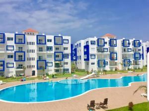 Bazén v ubytování APPARTEMENT KARIAT CABO nebo v jeho okolí