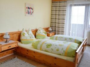 A bed or beds in a room at Apartment Jägerhof-1 by Interhome