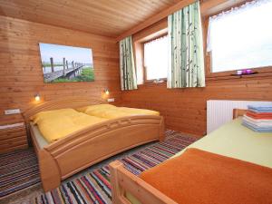 Llit o llits en una habitació de Apartment Annelies-1 by Interhome