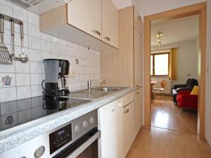 a kitchen with a sink and a stove at Apartment Handle-3 by Interhome in Ried im Oberinntal