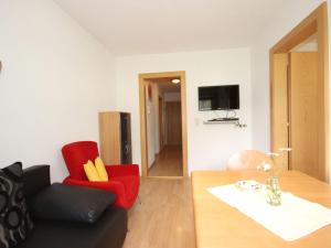 Televízia a/alebo spoločenská miestnosť v ubytovaní Apartment Handle-3 by Interhome