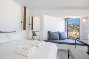 Postel nebo postele na pokoji v ubytování Aros Luxury Villas + 37 fotografií