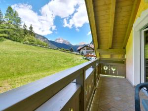 a balcony with a view of the mountains at Apartment Cecilia-4 by Interhome in Campitello