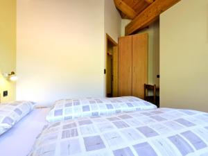Postel nebo postele na pokoji v ubytování Apartment Cecilia-4 by Interhome