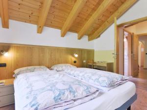 Postel nebo postele na pokoji v ubytování Apartment Cecilia-4 by Interhome