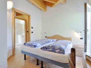 Postel nebo postele na pokoji v ubytování Apartment Cecilia-4 by Interhome