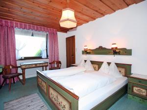 Postel nebo postele na pokoji v ubytování Apartment Lener-2 by Interhome