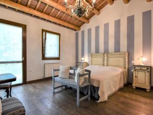Posteľ alebo postele v izbe v ubytovaní Holiday Home Azienda Agricola Forzello-1 by Interhome