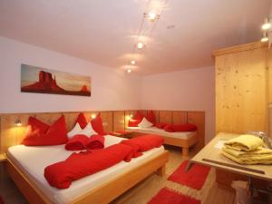 Posteľ alebo postele v izbe v ubytovaní Apartment Evi by Interhome