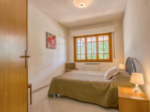 Posteľ alebo postele v izbe v ubytovaní Apartment Montaleo 1 by Interhome