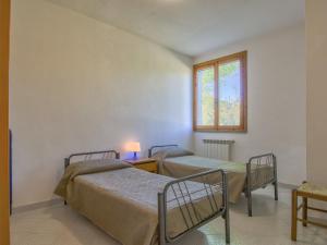 Posteľ alebo postele v izbe v ubytovaní Apartment Montaleo 1 by Interhome