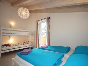 Posteľ alebo postele v izbe v ubytovaní Chalet am Arlberg by Interhome + 18 fotografií