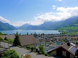 a view of a town with a lake and mountains at Apartment Hegglistrasse 9-1 by Interhome in Buochs