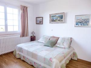 Postel nebo postele na pokoji v ubytování Holiday Home Carpe Diem by Interhome