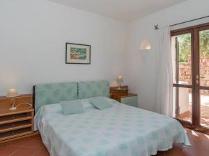 Кровать или кровати в номере Apartment Pino by Interhome