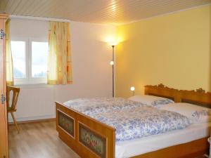Posteľ alebo postele v izbe v ubytovaní Apartment Elsa by Interhome