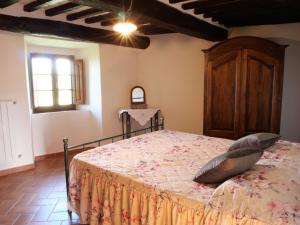 Posteľ alebo postele v izbe v ubytovaní Apartment Rosa - Borgo la Civitella by Interhome
