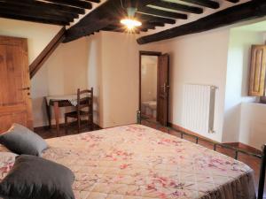 Posteľ alebo postele v izbe v ubytovaní Apartment Rosa - Borgo la Civitella by Interhome + 20 fotografií