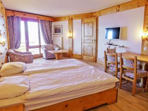 Postel nebo postele na pokoji v ubytování Apartment Le Bristol A38 by Interhome