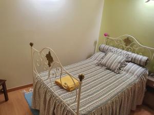Säng eller sängar i ett rum på Olinda Home