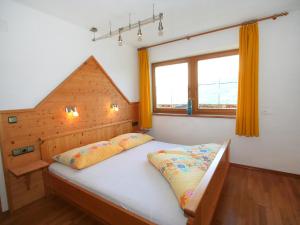 Posteľ alebo postele v izbe v ubytovaní Apartment Hansjörg-5 by Interhome