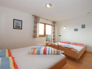 Posteľ alebo postele v izbe v ubytovaní Apartment Hansjörg-5 by Interhome