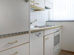 Apartment Matten - Utoring-16 by Interhomeにあるキッチンまたは簡易キッチン