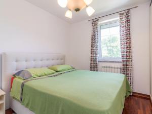 Postel nebo postele na pokoji v ubytování Holiday Home Jadranka by Interhome