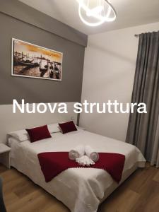 a bedroom with a large bed in a room at Venice Rooms in Mestre