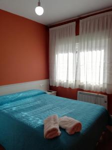 Łóżko lub łóżka w pokoju w obiekcie O Encontro