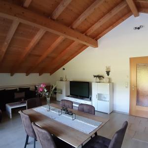 Sjónvarps- og/eða afþreyingartæki á Appartement Au +37 myndir