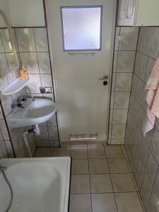 Ванная комната в Domek w sadzie na Mazurach