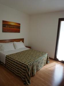 Кровать или кровати в номере Hotel Nicolaj