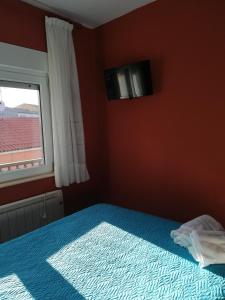 Łóżko lub łóżka w pokoju w obiekcie O Encontro