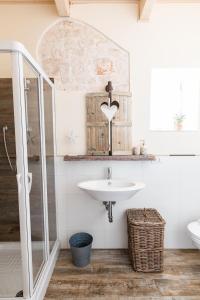 Ένα μπάνιο στο Camere Caroseno +58 φωτογραφίες